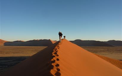 Walking on sand dunes, Namibia