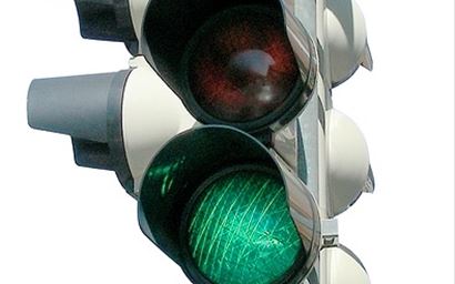 traffic lights on green with white background