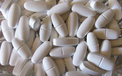 loose white calcium and vitamin D tablets