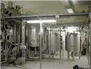 Fermentation plant Fermentation plant with 3 m³ and 10 m³ reactors. Smaller tanks to the right are substrate reservoirs (concentrated medium).