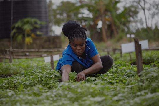 A woman working in a field