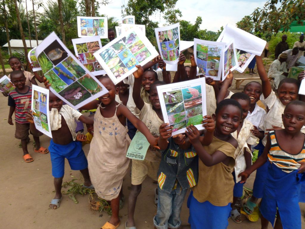 Village children showing-off their posters