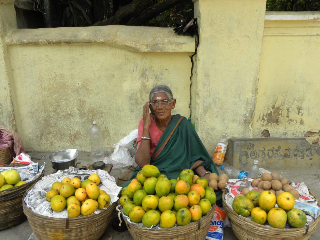Fruit Seller Woman on Mobile