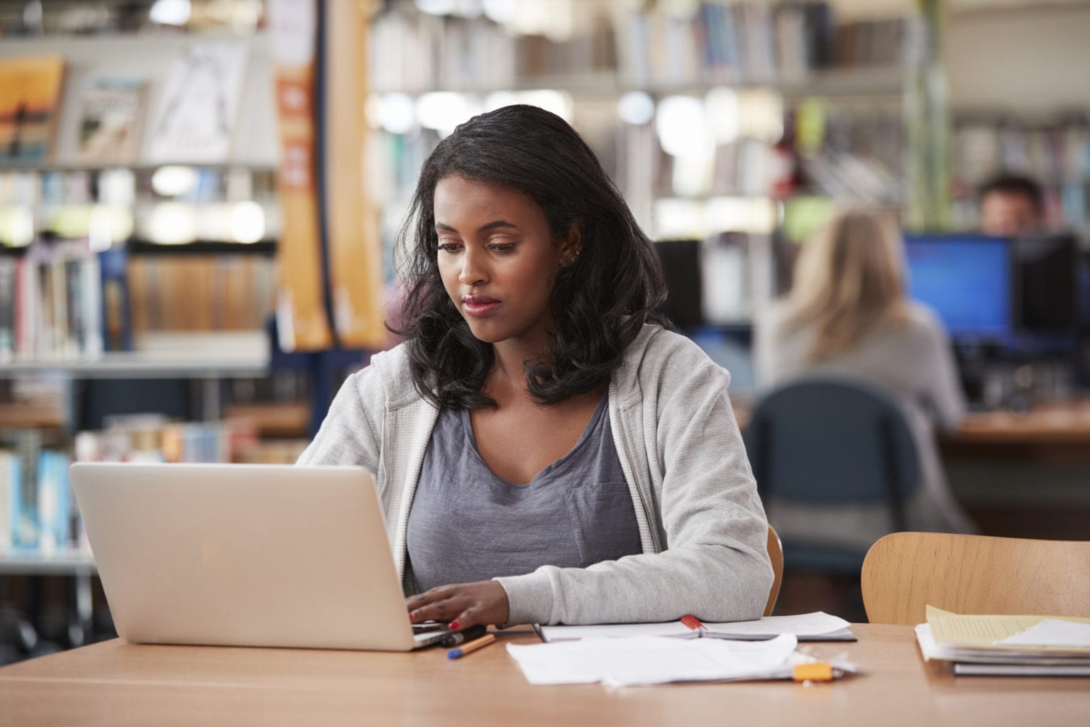 iStock-877026278 Lady at desk with laptop