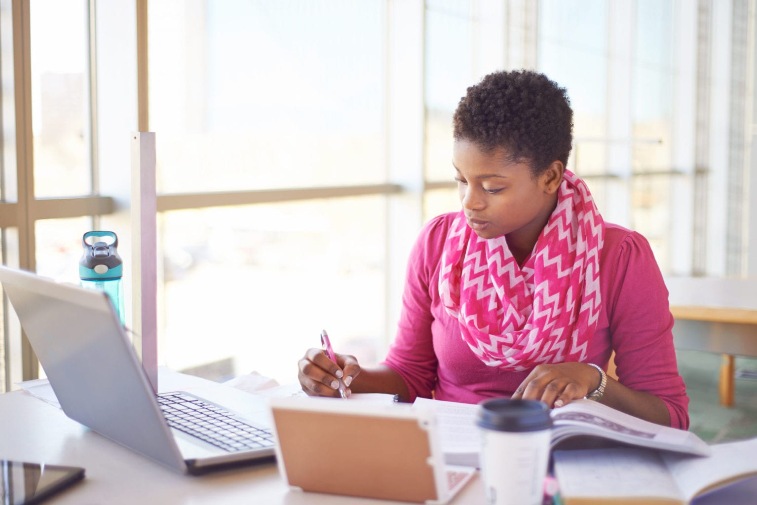 Lady studying at desk